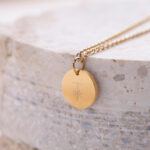 "Stand in Your Love" Pendant with Floral Cross Engraving